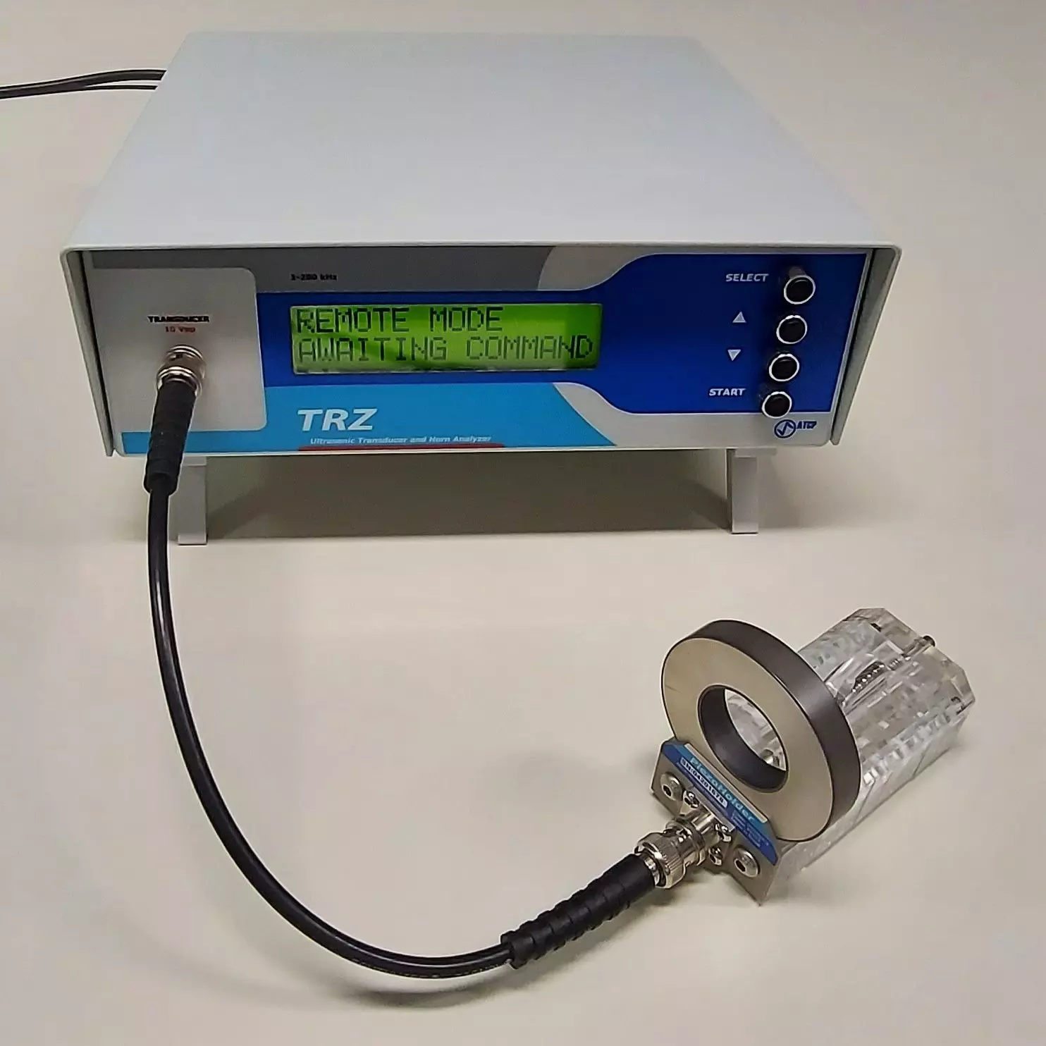 TRZ Analyzer with PiezoHolder testing a piezoelectric ceramic.